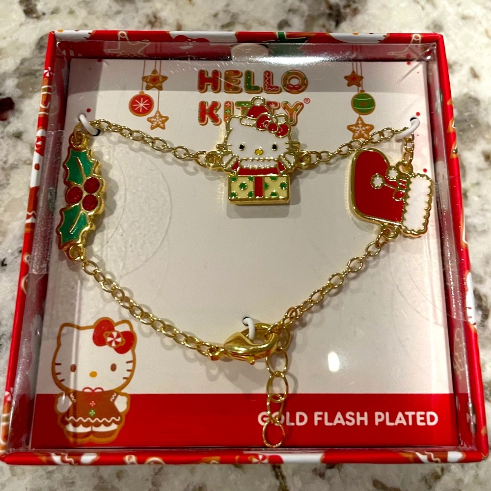 Hello Kitty Gold Plated Bracelet and charms - NWOT